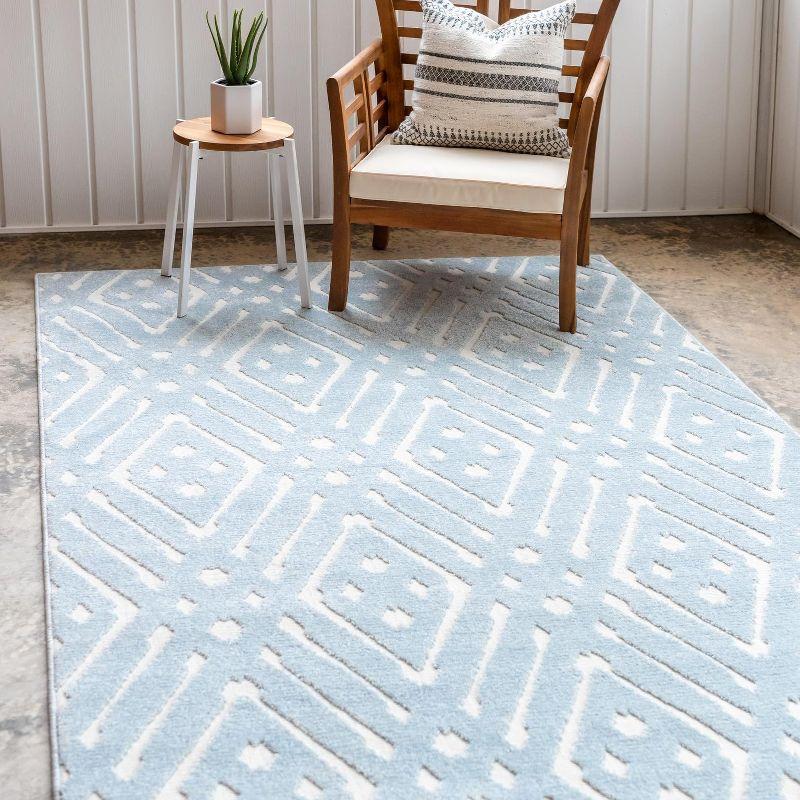 Light Blue Geometric 4' x 6' Synthetic Outdoor Area Rug