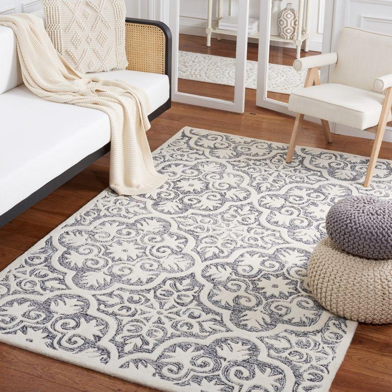 Metro MET859 Hand Tufted Area Rug  - Safavieh