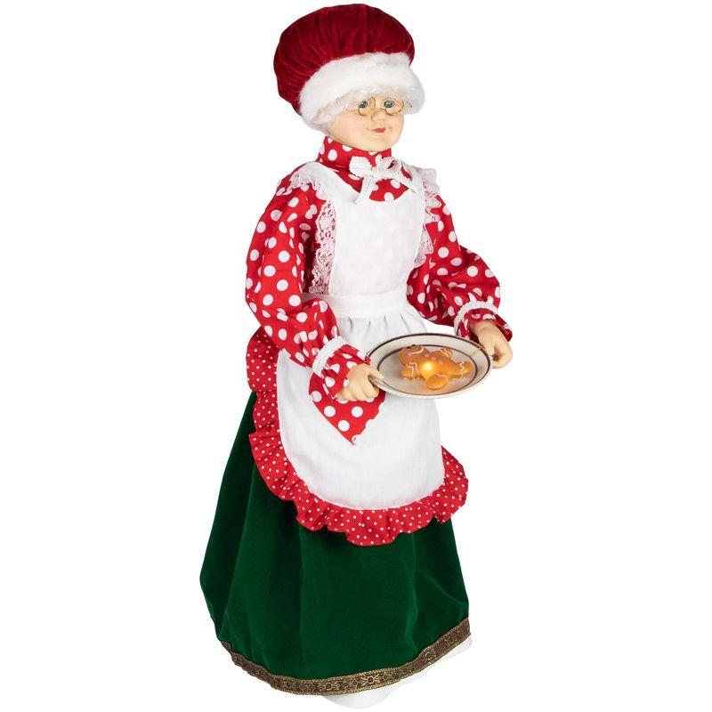 Mrs. Claus with Gingerbread Cookie Figure