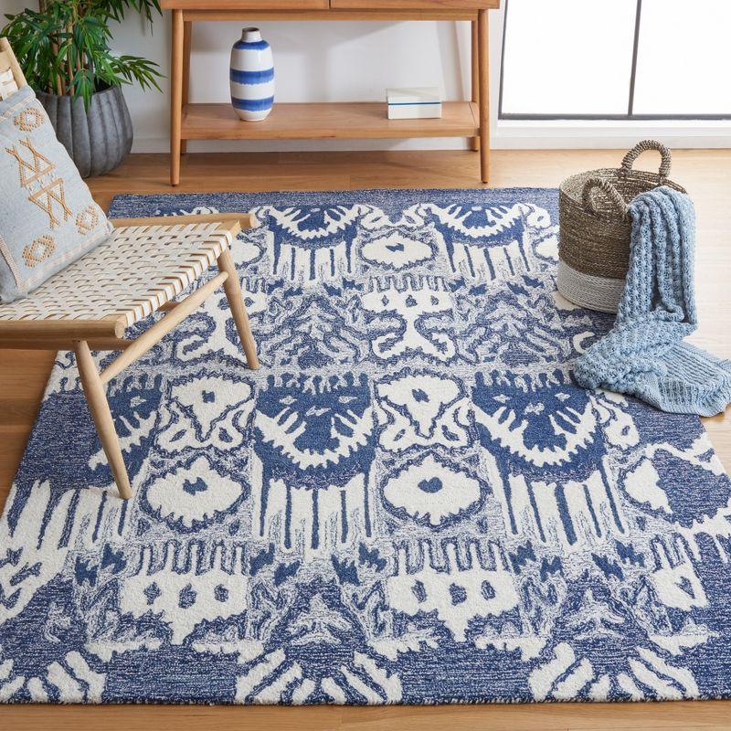 Handmade Bohemian Blue and Ivory Wool Area Rug 8' x 10'