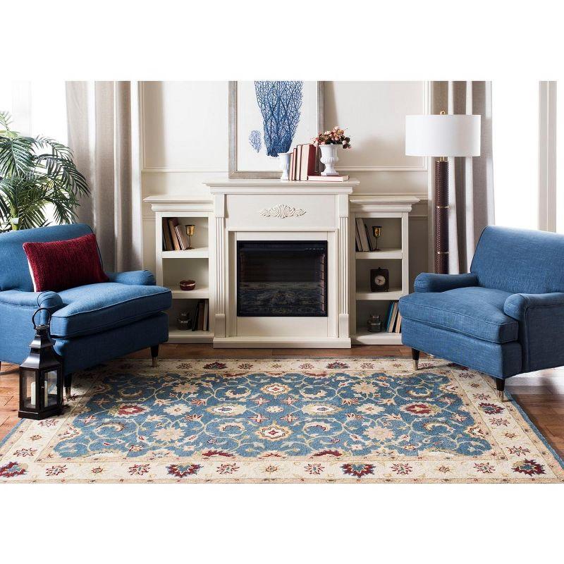 Antiquity Inspired Blue and Beige Handmade Wool Area Rug - 7'6" x 9'6"