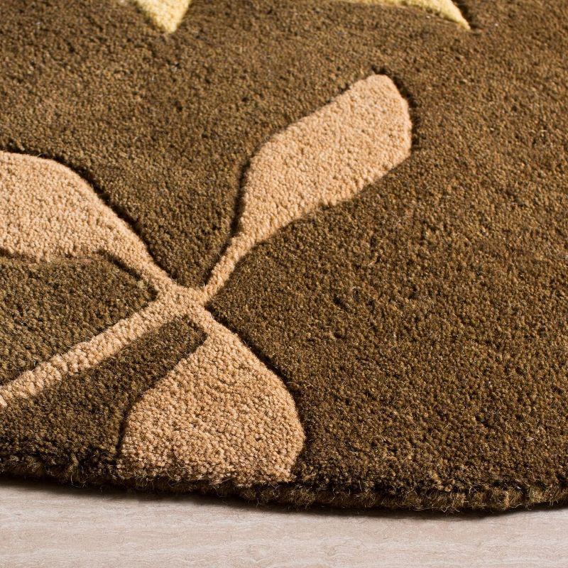 Soho SOH833 Hand Tufted Indoor Area Rug - Brown/Multi - 6' round - Safavieh.