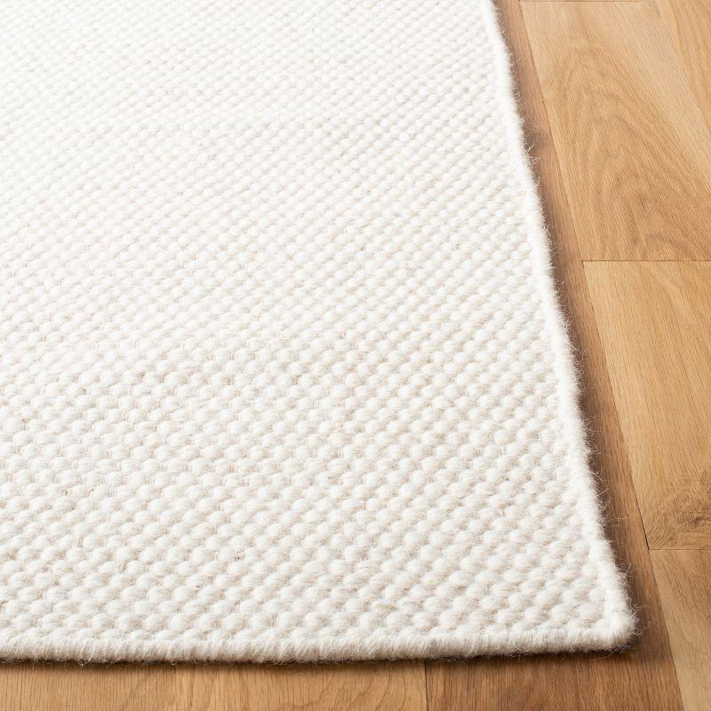 Opperman Hand Tufted Solid Color Rug