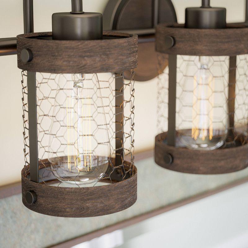 Co-t Kenroy Home Industrial Farmhouse 3-Light Bath Vanity Fixture With Chicken Wire Mesh Shades & Distressed Wood Accents