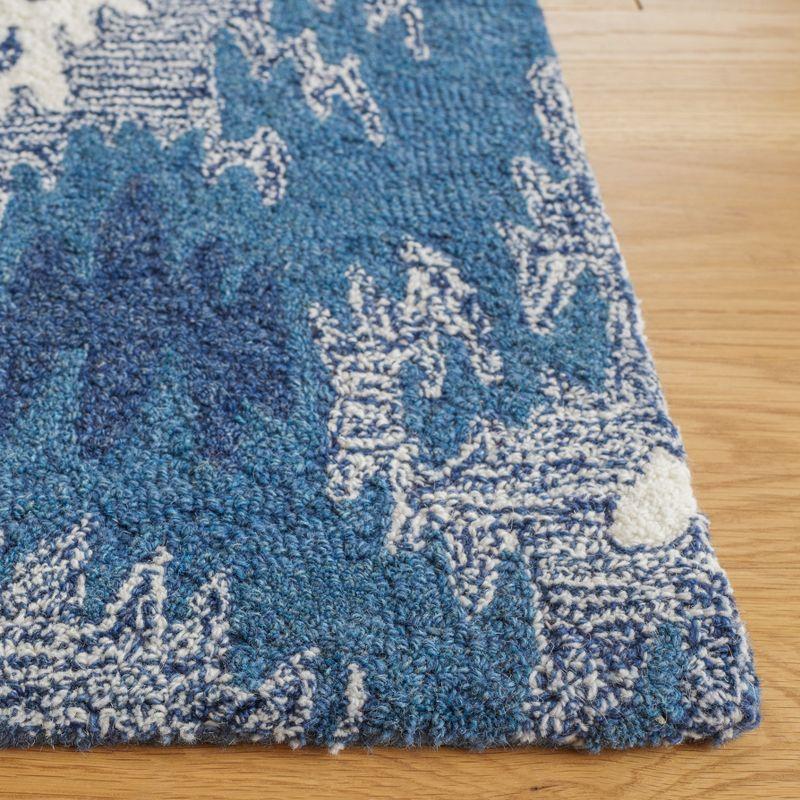 Ikat IKT652 Hand Tufted Area Rug - Blue/Ivory - 8'x10' - Safavieh.