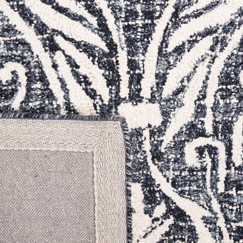 Ivory and Navy Abstract Handmade Wool Area Rug