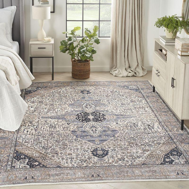 Ivory Blue 9' x 12' Synthetic Flat Woven Washable Rug