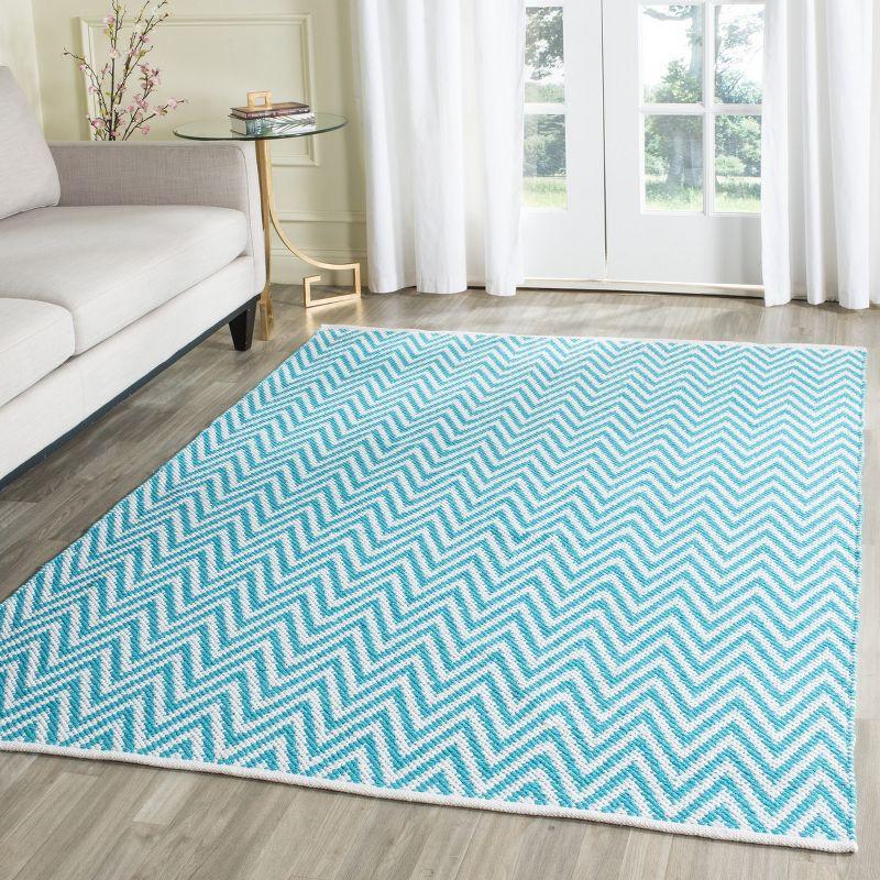 Montauk MTK812 Hand Woven Indoor Area Rug - Turquoise/Ivory - 5'x7' - Safavieh.