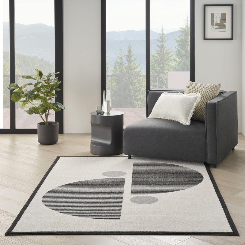 Nourison Modern Passion Circle Mid-Century Modern Indoor Rug Ivory/Black 6' x 9'