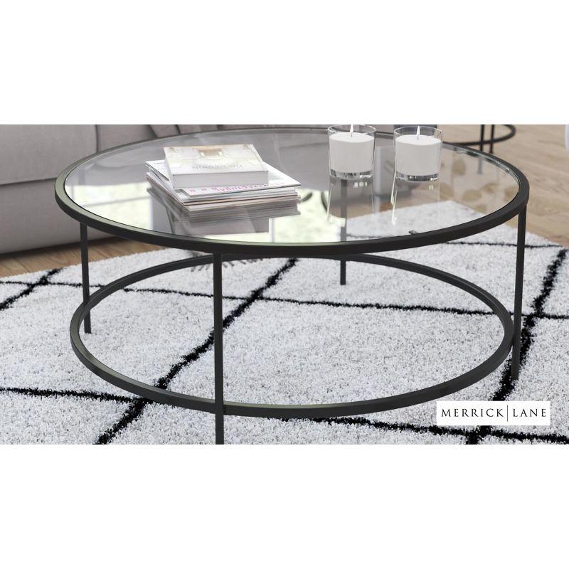 Merrick Lane Newbury Glass Coffee Table with Round Matte Gold Frame and Vertical Legs