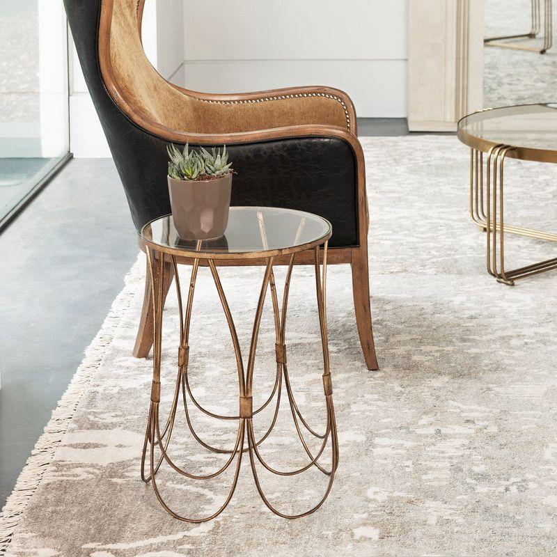 Kalindra Round Gold Metal and Glass Accent Table