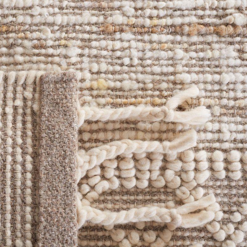 Ivory and Beige Handwoven Wool Area Rug, 4' x 6'