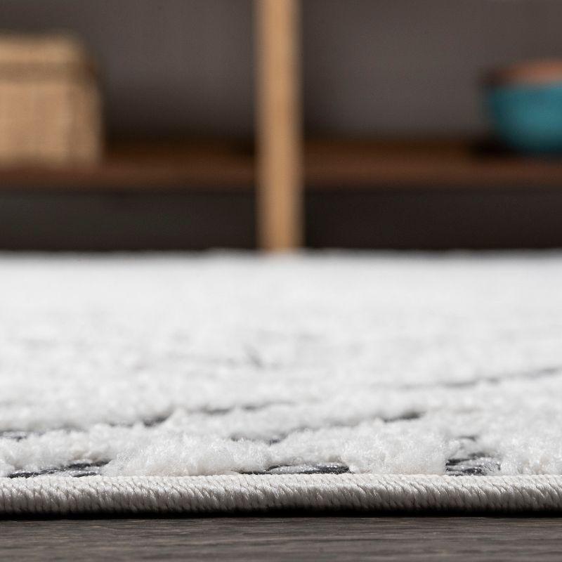 4'x6' Jordan High-Low Pile Art Deco Geometric Indoor/Outdoor Area Rug, White/Black - JONATHAN Y