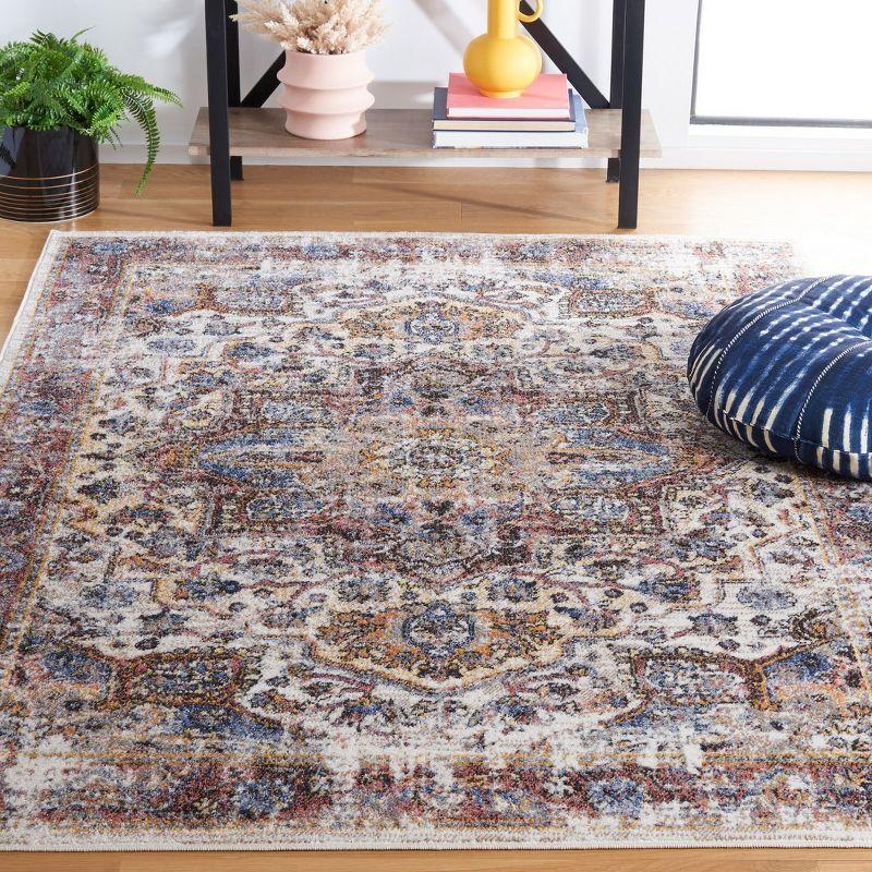 Ivory and Blue Rust Traditional 4' x 6' Synthetic Area Rug