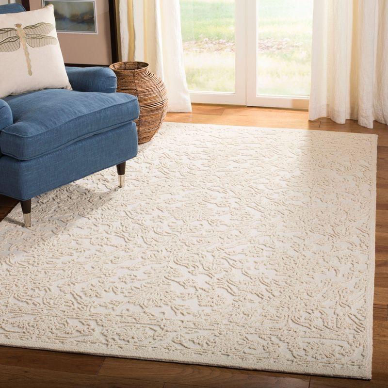 Elegant Ivory Tufted Wool 8' x 10' Handmade Area Rug