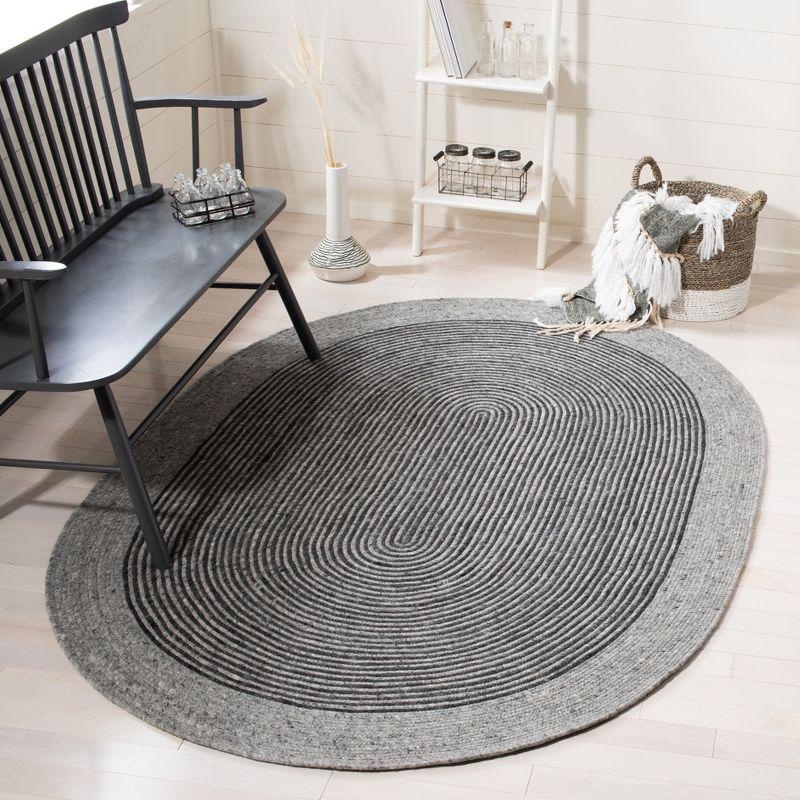 Gray and Black Oval Braided Wool Area Rug 6' x 9'