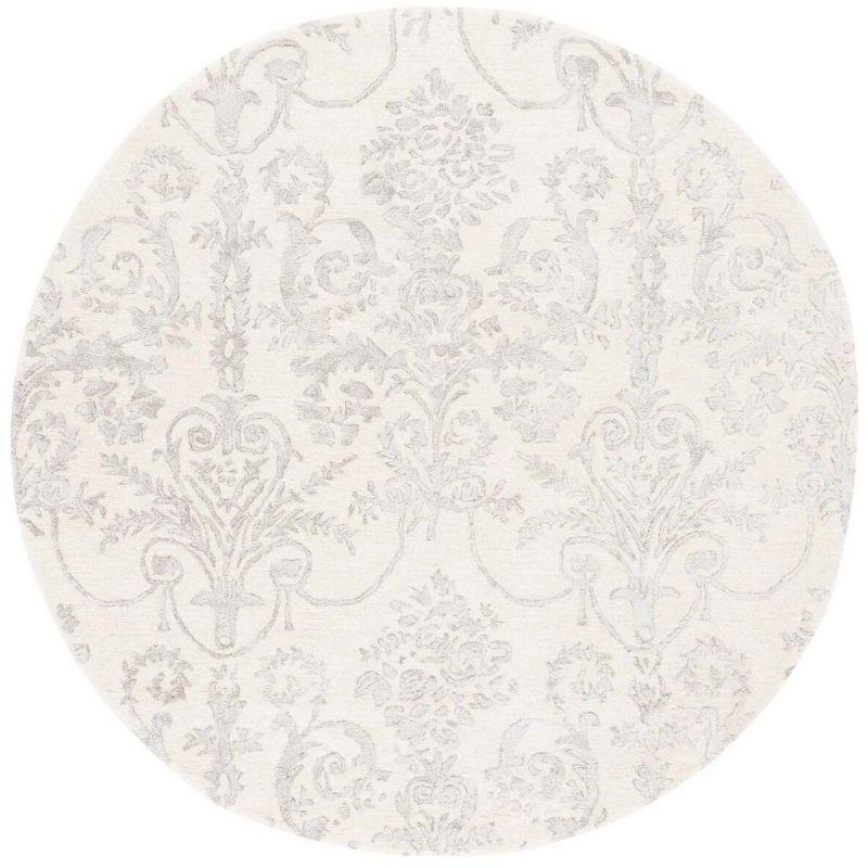 Hand-tufted Elegance Round Gray Wool & Viscose Rug - 59"