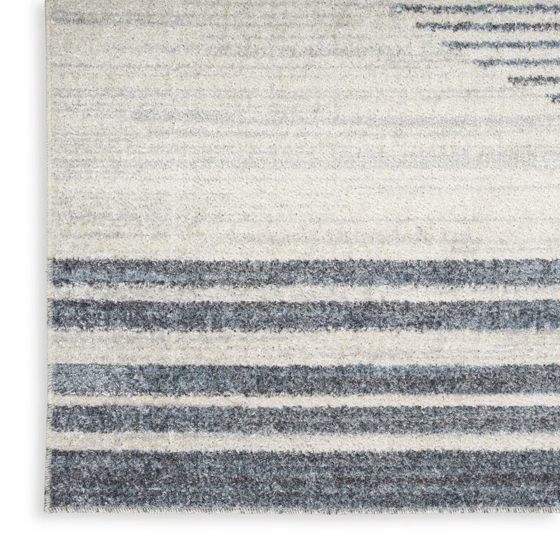 Nourison Astra Machine Washable Stripe Circle Mid-Century Modern Indoor Rug Ivory Blue 5'3" x 7'