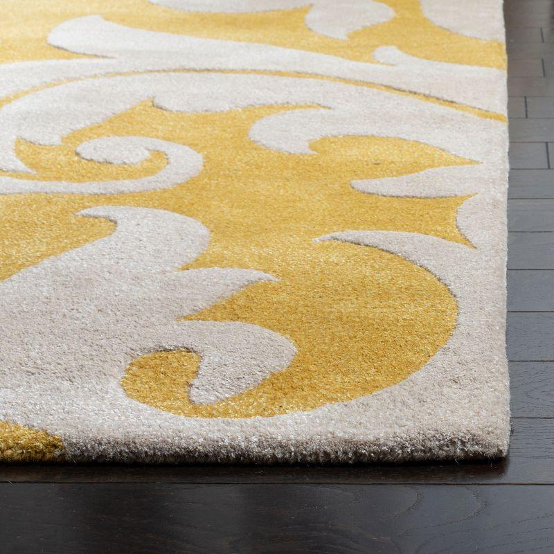 Soho SOH841 Hand Tufted Area Rug - Gold/Ivory - 6'x6' - Safavieh.
