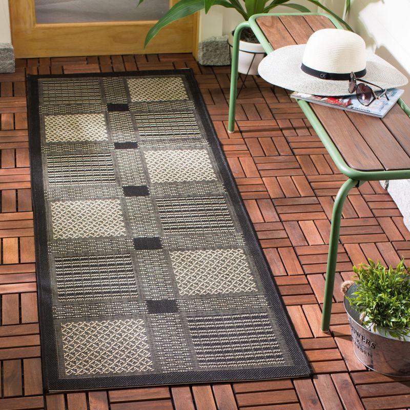 Black and Sand Geometric Outdoor Runner Rug