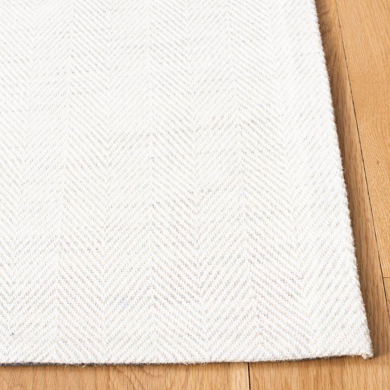 Ivory and Silver Handwoven Wool Viscose 4' x 6' Area Rug