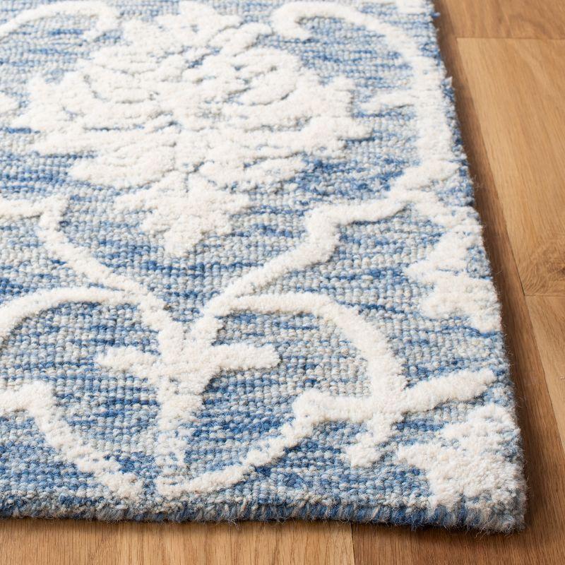 Handmade Blue Floral Wool 4' x 6' Tufted Area Rug