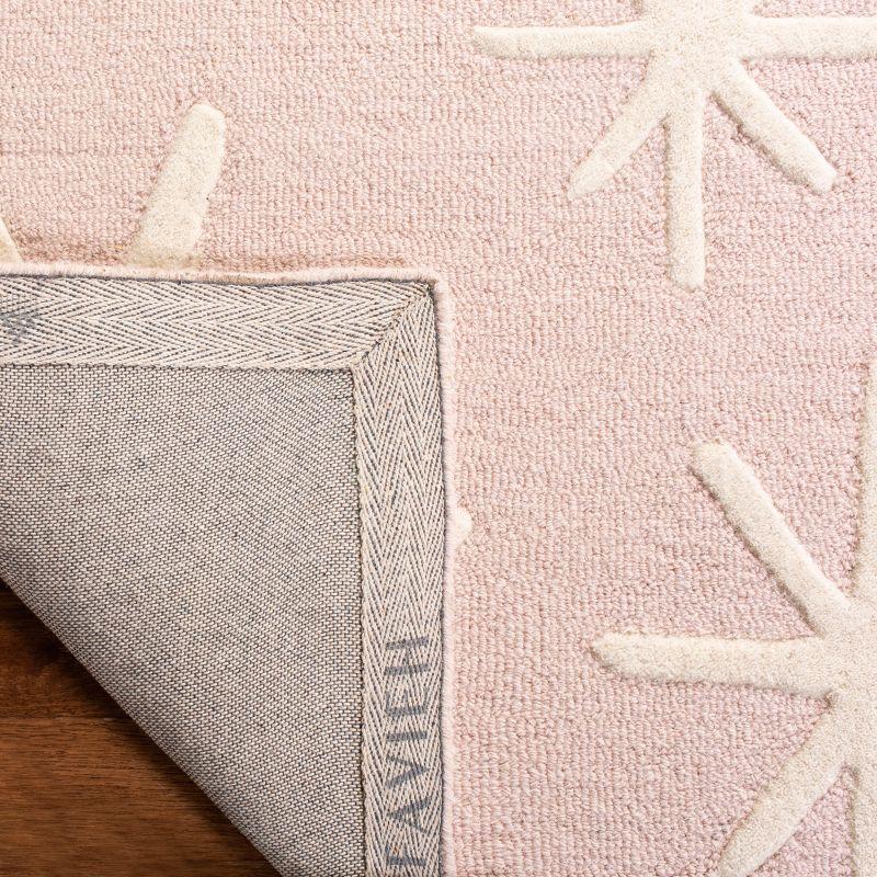 Safavieh Kids SFK908 Hand Tufted Area Rug - Pink/Ivory - 3'x5' - Safavieh.