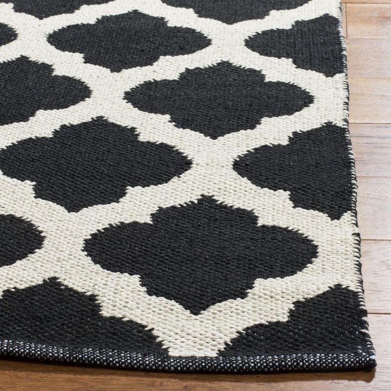 Montauk MTK723 Hand Woven Indoor Area Rug - Black/Ivory - 8'x10' - Safavieh.