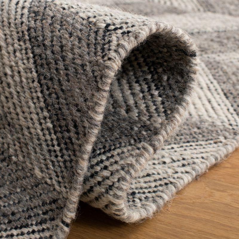 Nomadic Essence Handwoven Wool Rug in Grey - 5' x 8'