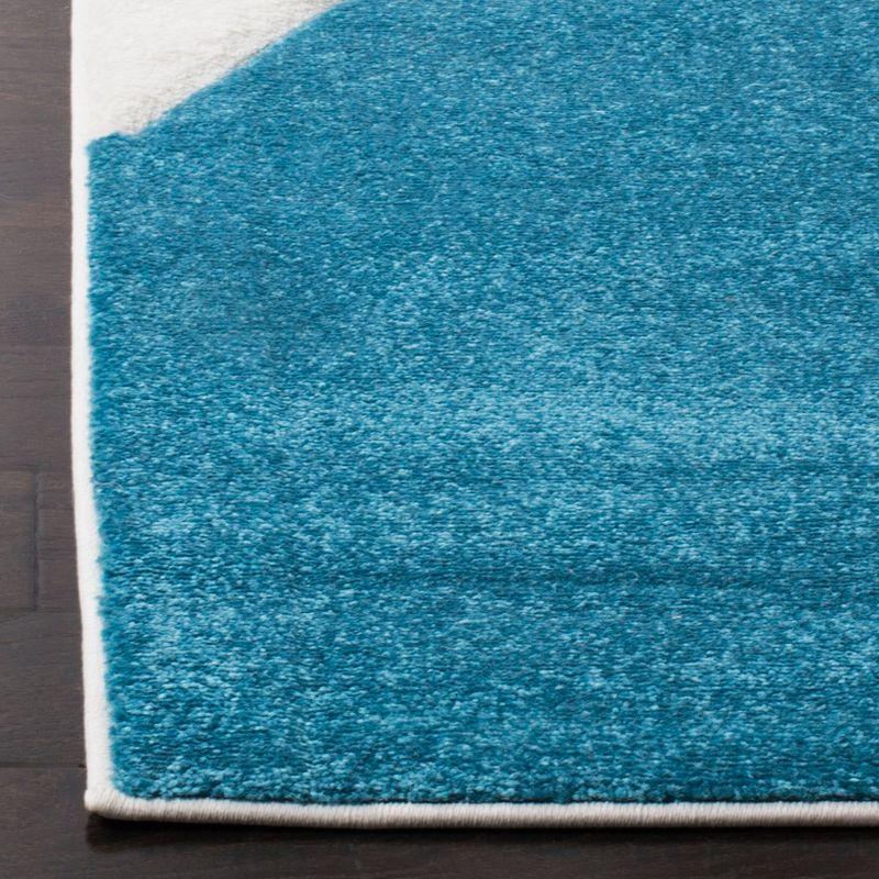 26" x 6" Blue Geometric Synthetic Easy Care Rug