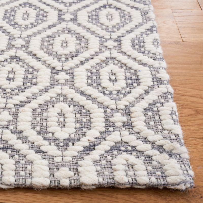 Grey and Ivory Handwoven Wool and Synthetic Area Rug, 8' x 10'