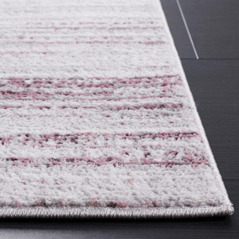 8' x 10' Purple and Ivory Abstract Synthetic Rug