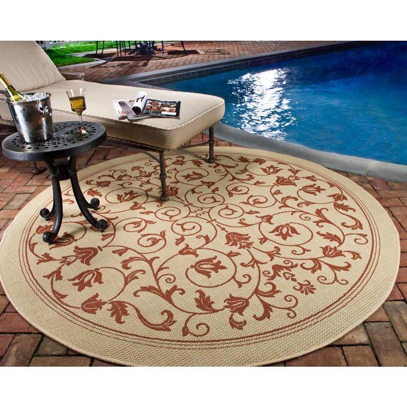 Beige and Tan Round Floral Synthetic Indoor/Outdoor Rug