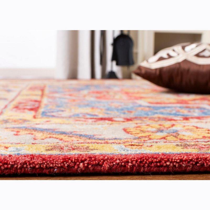 Handmade Red and Blue Tufted Wool Area Rug