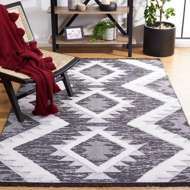 Nomadic Charm Black/Ivory Synthetic 8' x 10' Area Rug