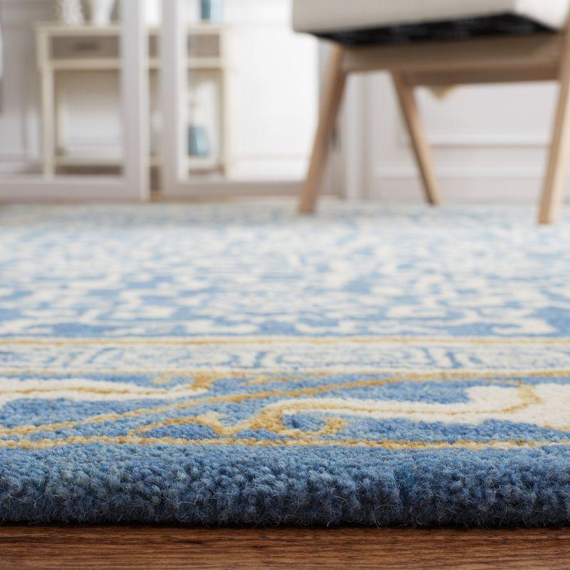 Antiquity AT860 Hand Tufted Indoor Area Rug - Blue/Ivory - 5'x8' - Safavieh