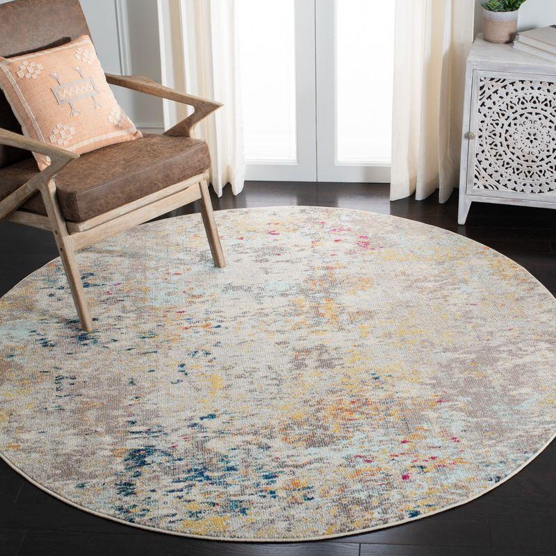 Round Grey and Gold Hand-knotted Synthetic Area Rug