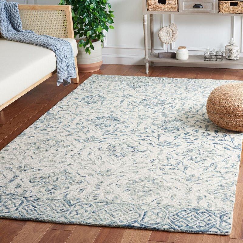 Pimentel Hand-Tufted Wool Blue/Ivory Area Rug