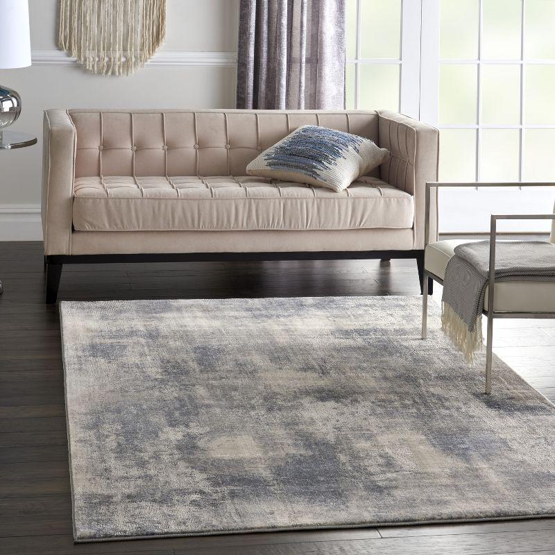 Abstract Blue and Ivory Weathered Textured Area Rug 3'11" x 5'11"