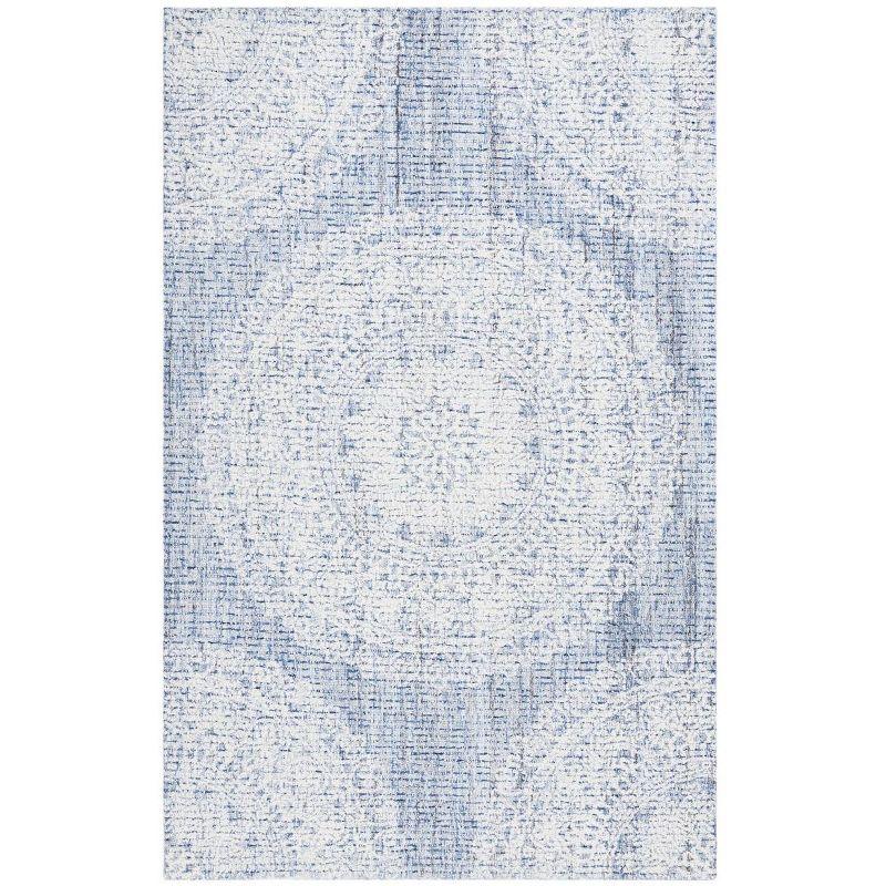 Blue and Ivory Hand Tufted Wool Area Rug 5' x 8'