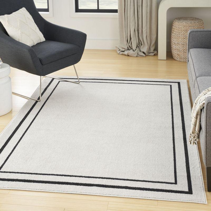 Nourison Essentials Bordered Indoor Outdoor Area Rug