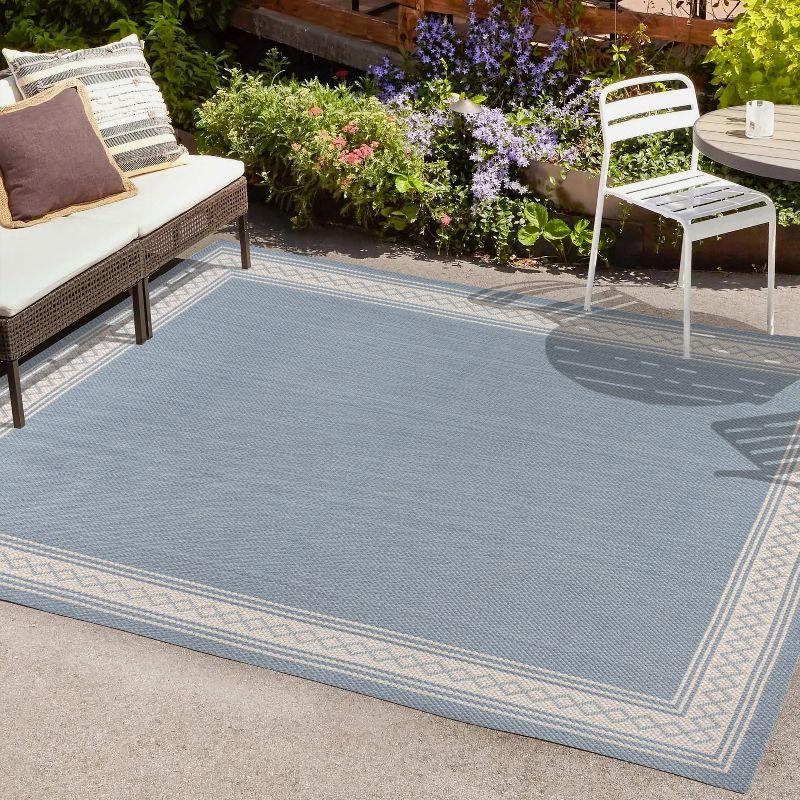 Modern Diamond Border 4' x 6' Blue Synthetic Area Rug