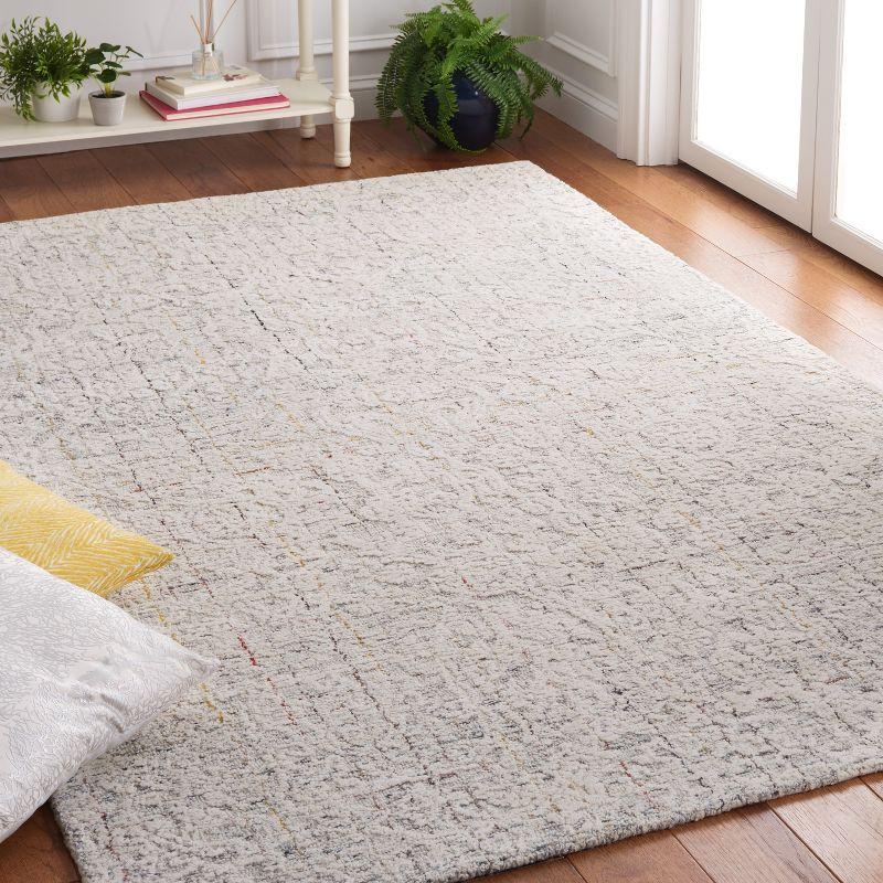 Handmade Grey/Ivory Tufted Wool Rectangular Area Rug