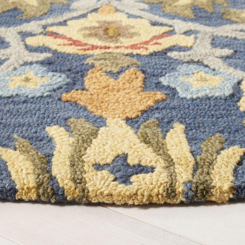 Blossom BLM402 Hand Tufted Area Rug - Navy/Multi - 4' round - Safavieh.