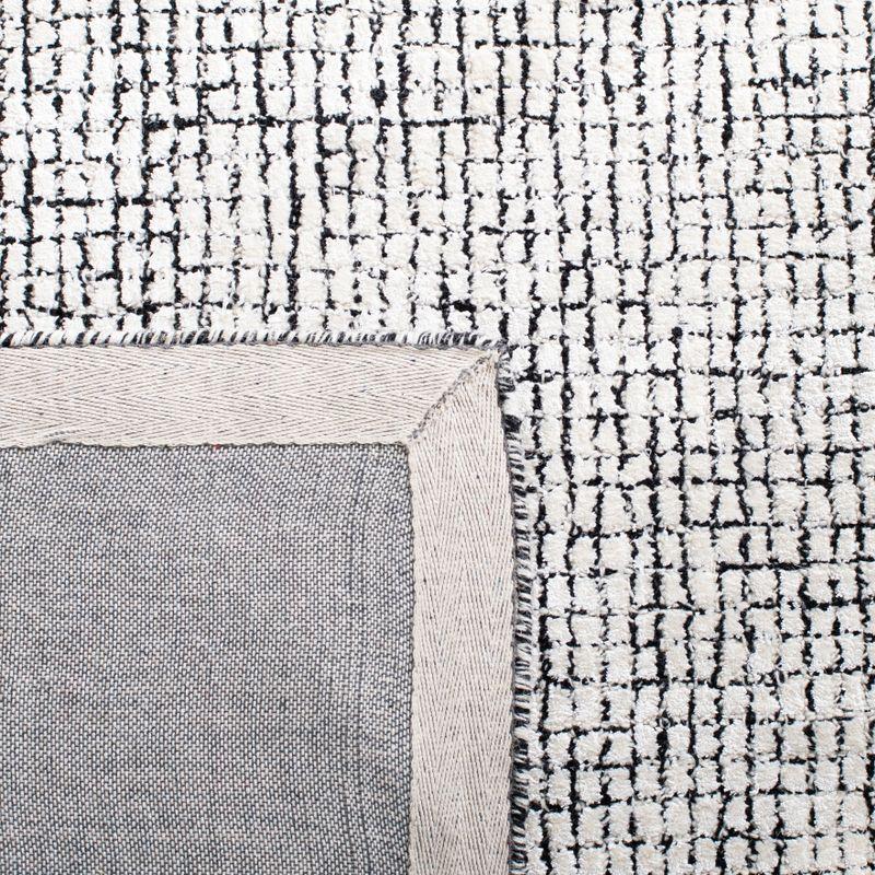 Handmade Abstract Ivory & Black Wool-Viscose 4' x 6' Area Rug