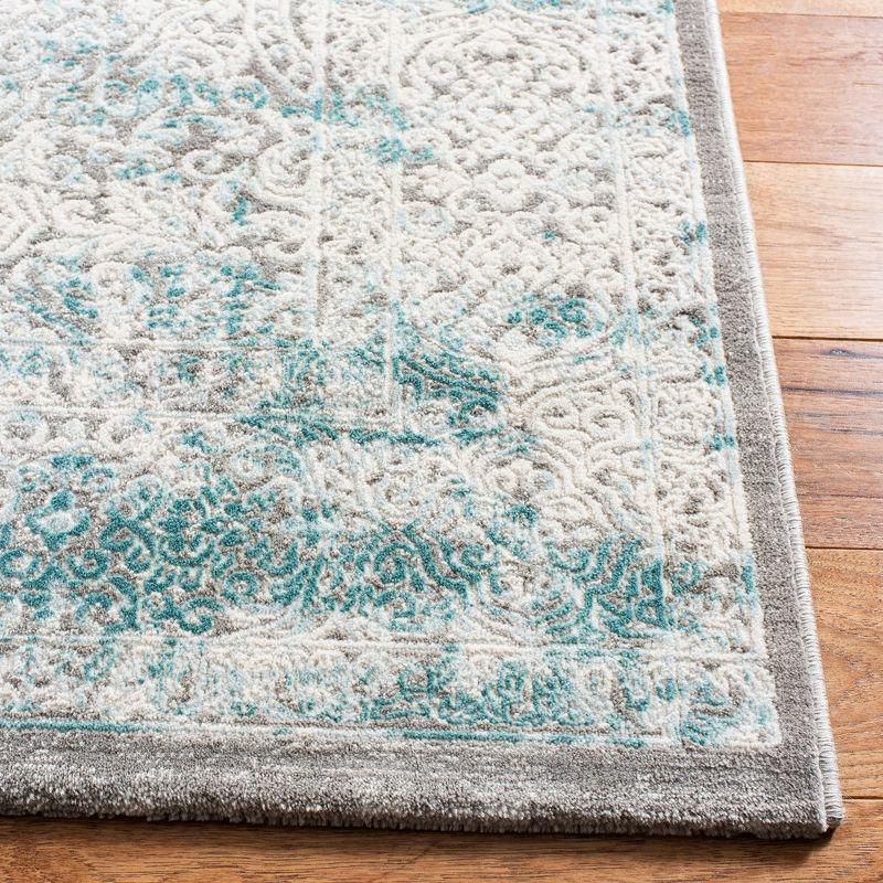 Elysian Ivory & Turquoise 9' x 12' Synthetic Reversible Area Rug