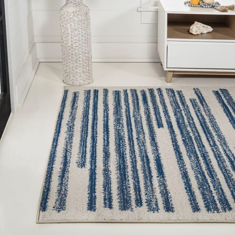 Khalil Cream and Navy Striped Synthetic Area Rug 5'3" x 7'7"