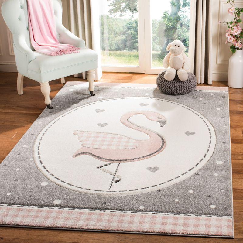 Pink and Ivory Flamingo Kids Synthetic Area Rug