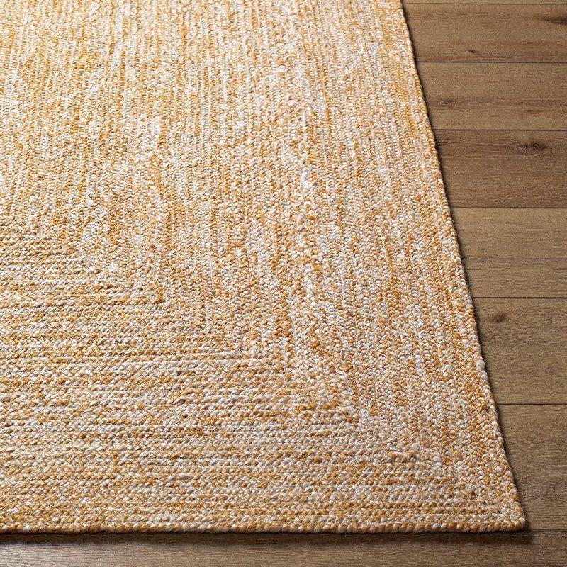 Ivory and Mustard Geometric Synthetic 5' x 7'6" Area Rug