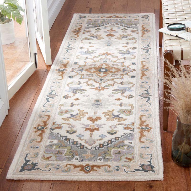 Heritage HG625 Handmade Runner Rug - 2'3"x12' - Ivory/Light Blue - Safavieh